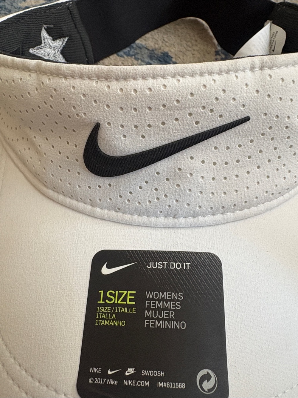 Nike White Perforated Women's Visor with Black Swoosh
